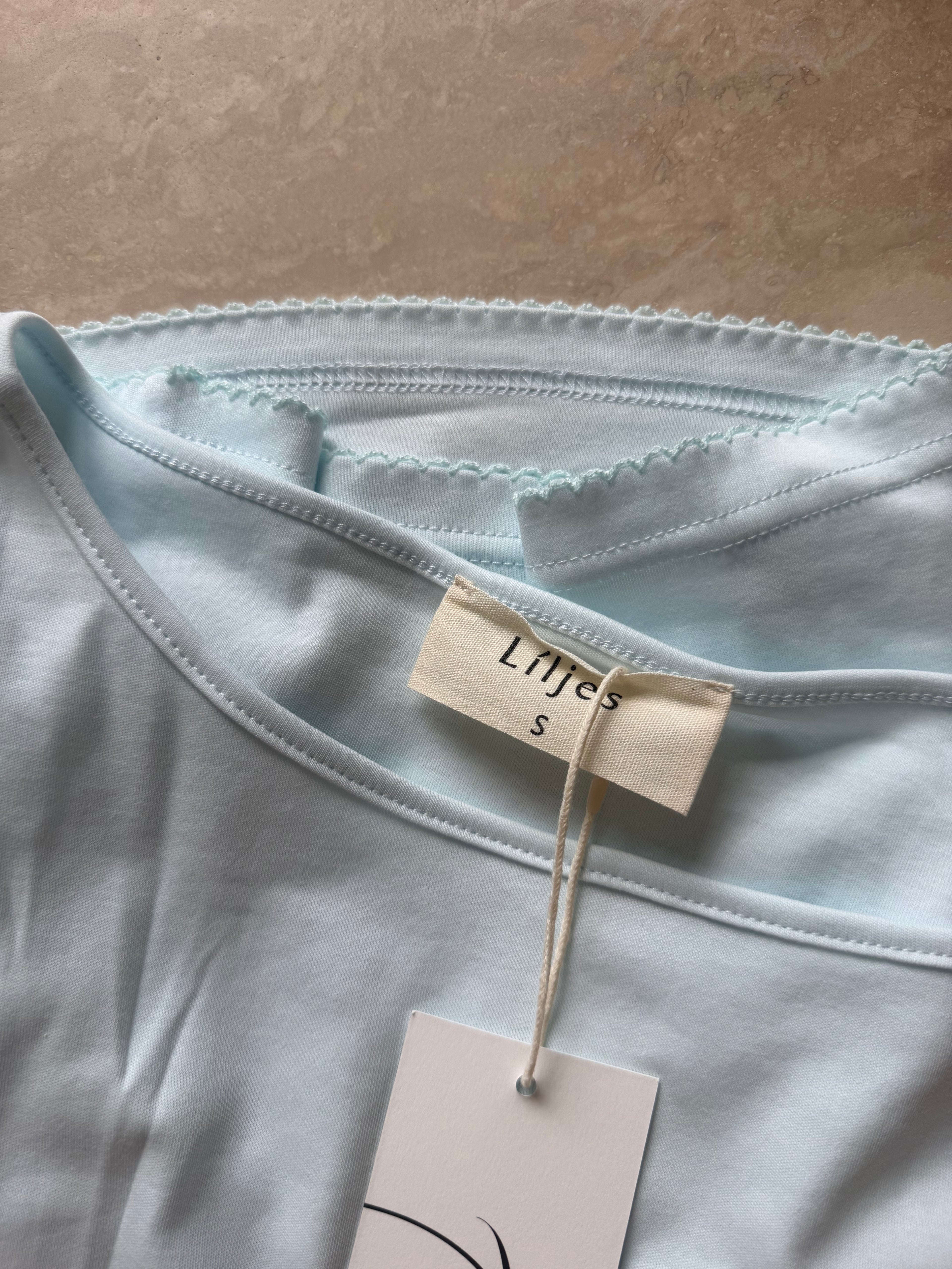 Softflare top lys blå